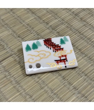 porte encens japonais en porcelaine aux motifs de portes torii sanctuaire fushimi inari kyoto